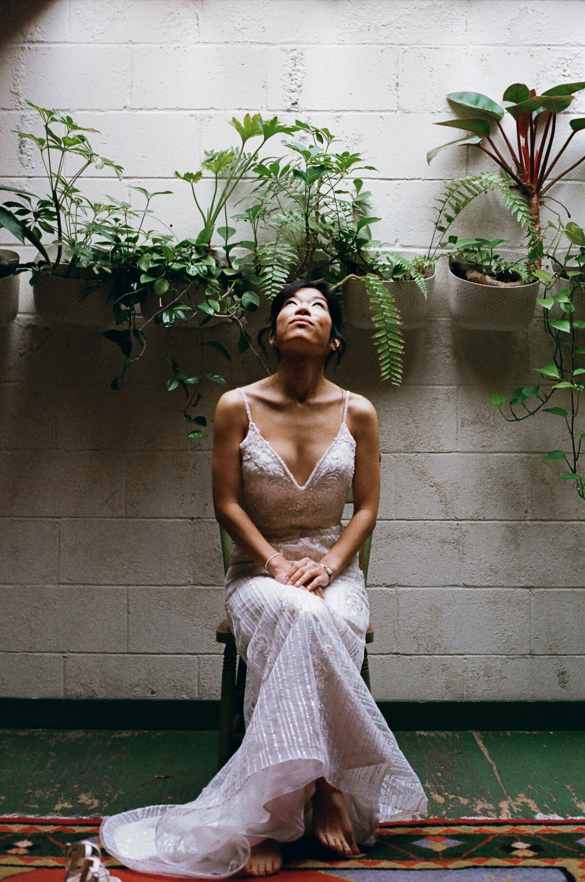 image of a bride at a wedding at The Smogshoppe in Culver City, CA captured by Los Angeles film documentary wedding photographer
