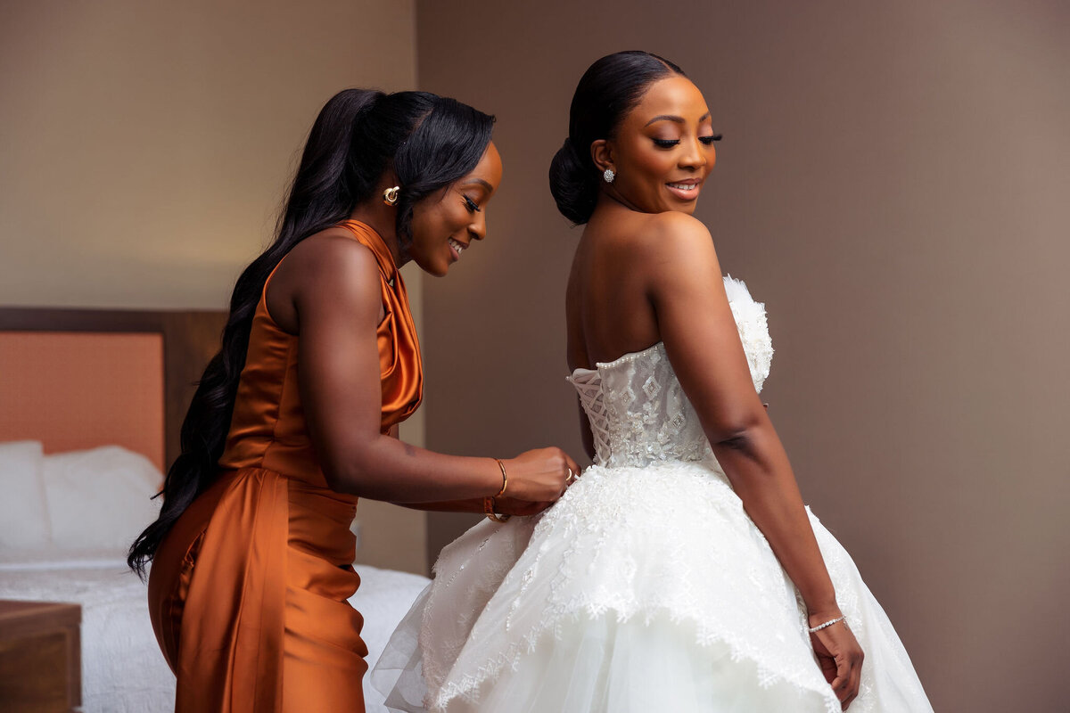 Tomi and Tolu Oruka Events Ziggy on the Lens photographer Wedding event planners Toronto planner African Nigerian Eyitayo Dada Dara Ayoola ottawa convention and event centre pocket flowers Navy blue groom suit ball gown black bride classy  46