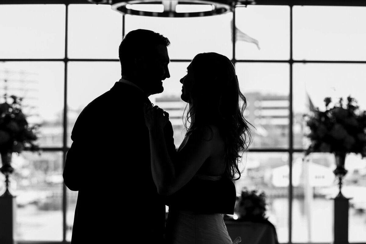 Silhouette of bride and groom sharing first dance  at Sheraton Erie Bayfront Hotel