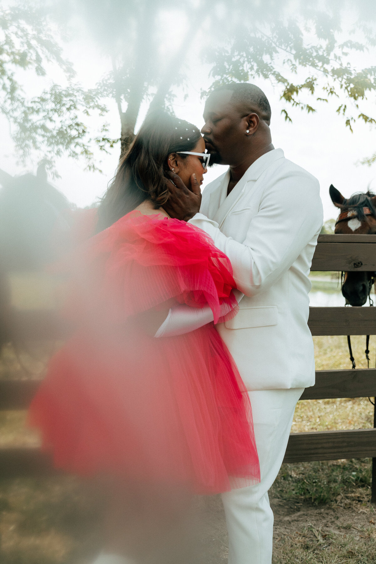 fun and creative engagement photos with pink dress