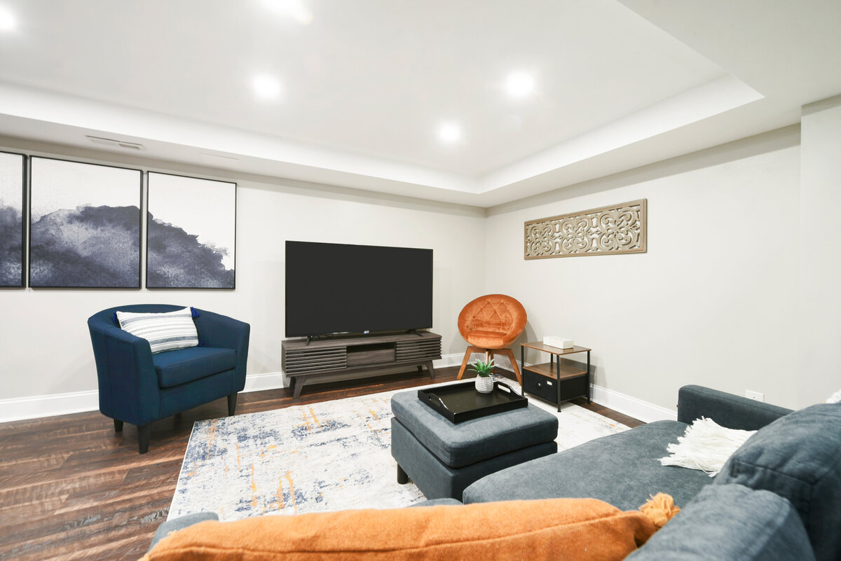 Professionally staged living room designed to maximize home value and buyer appeal