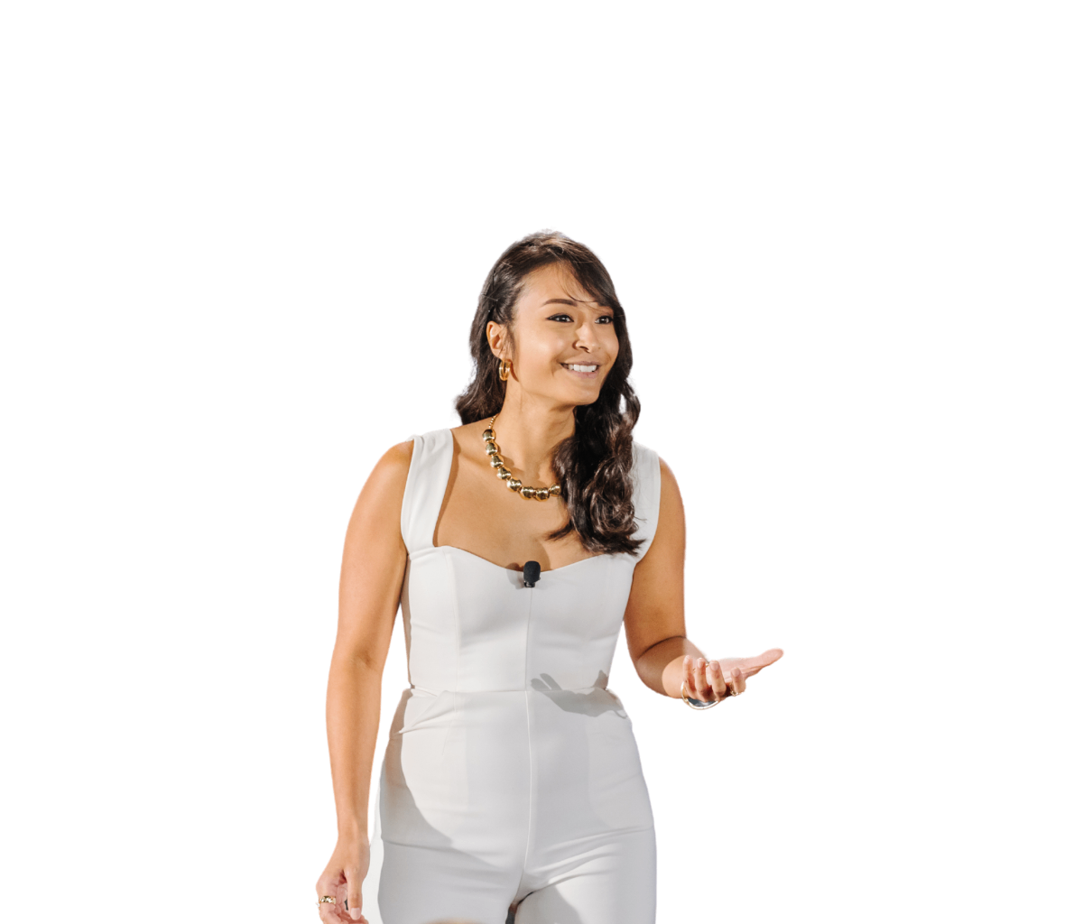 Trang smiling softly while delivering a speech. 
