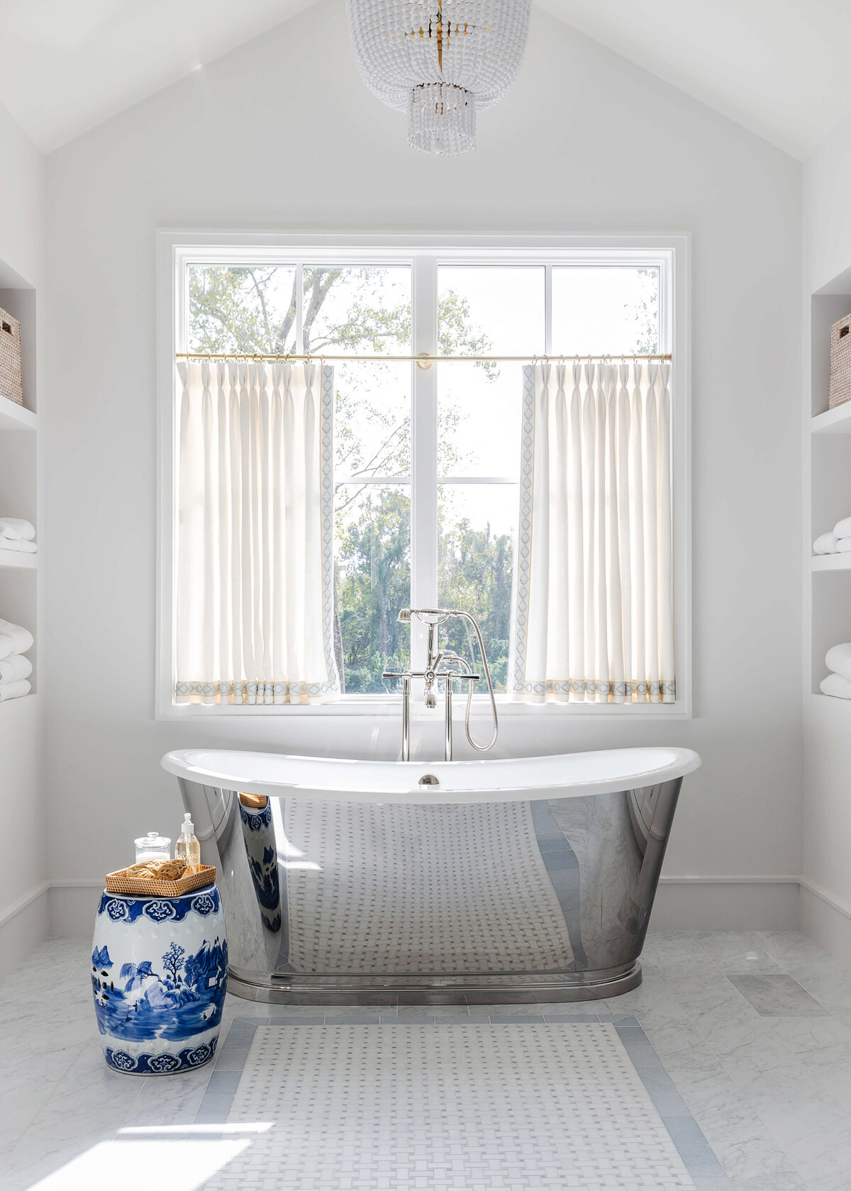 oyster creek studios memorial new build steel free standing bath with oriental vase in white bathroom