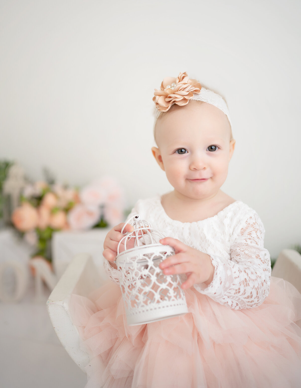 pink and white first birthday cake smash