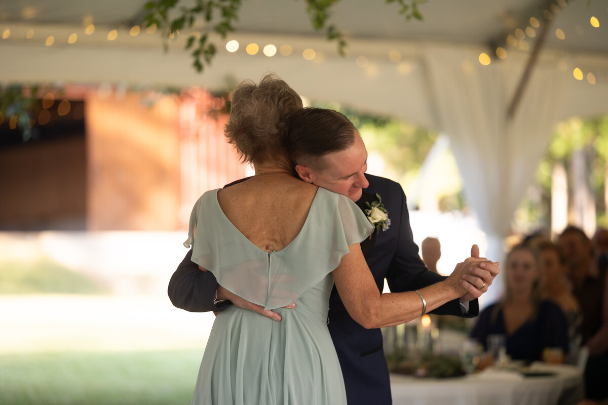 groom and mother of the groom sharing dance during wedding reception at The Cory House in Union Point Georgia by Atlanta Georgia Wedding Photographer Amanda Richardson Photography