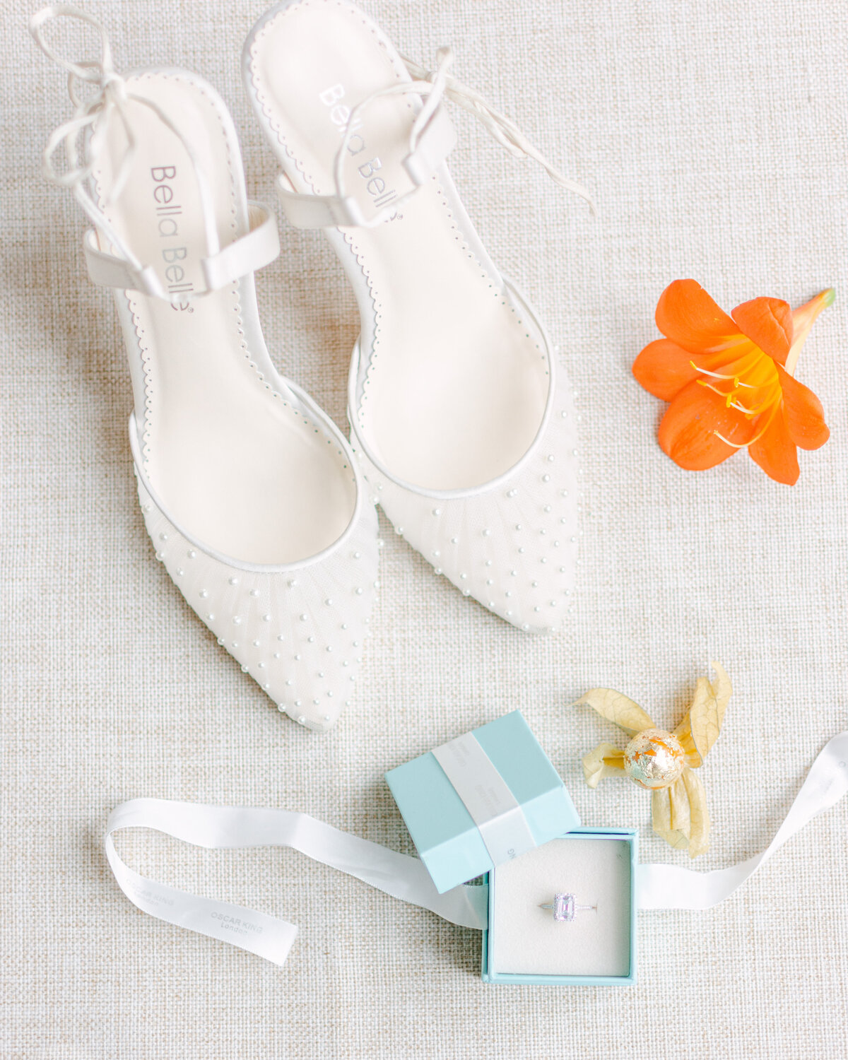 Bridal shoes and engagement ring at Prestwold Hall