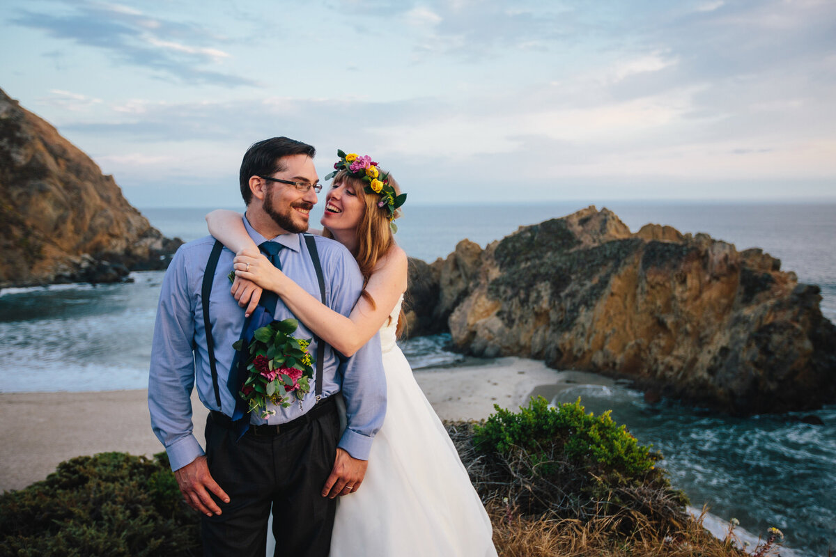 bride and groom on top of cliff during their bay area adventure elopement