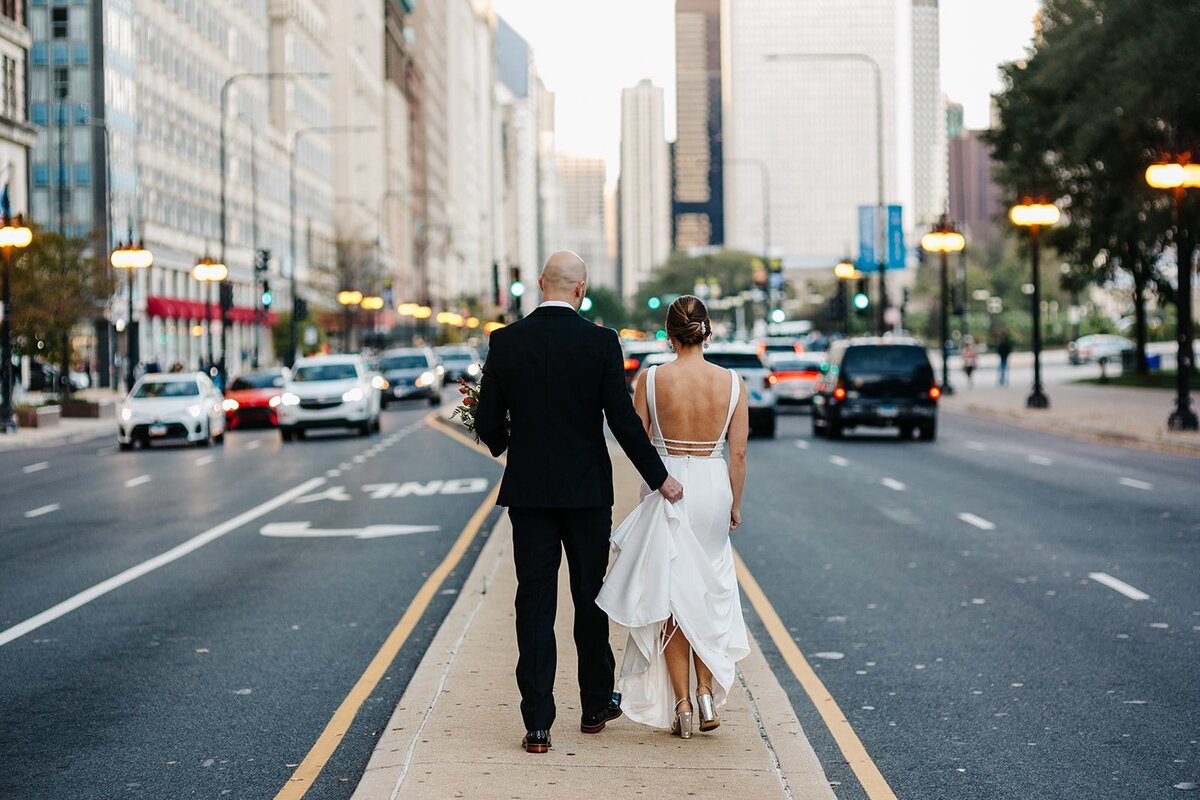 Bride and Groom Walking Through Chicago