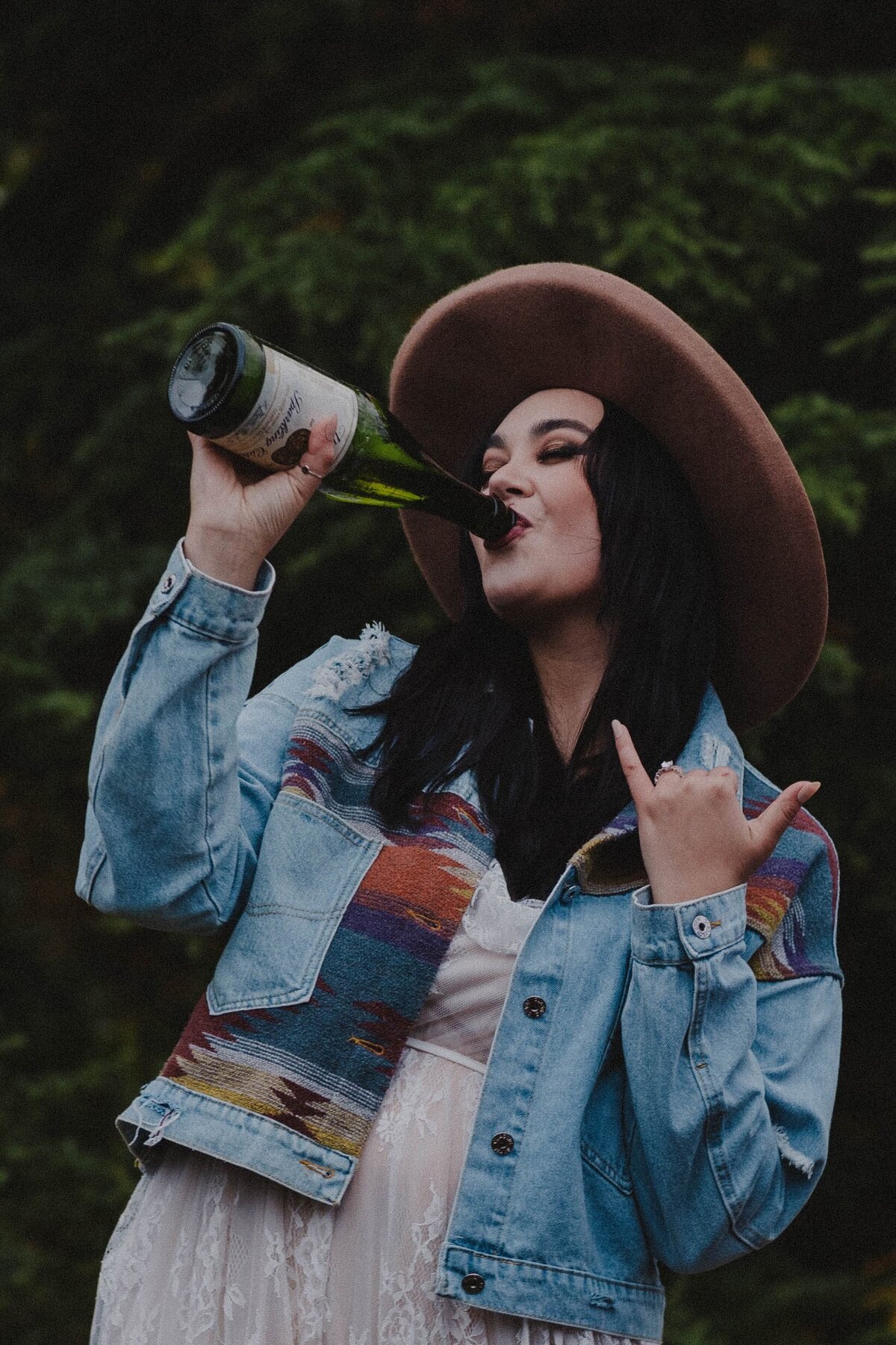 Alaska bride celebrates her elopement with some champagne