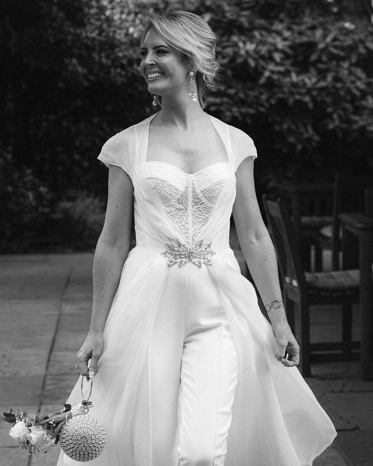 A bridal portrait as she prepares to walk down the aisle in and outdoor service