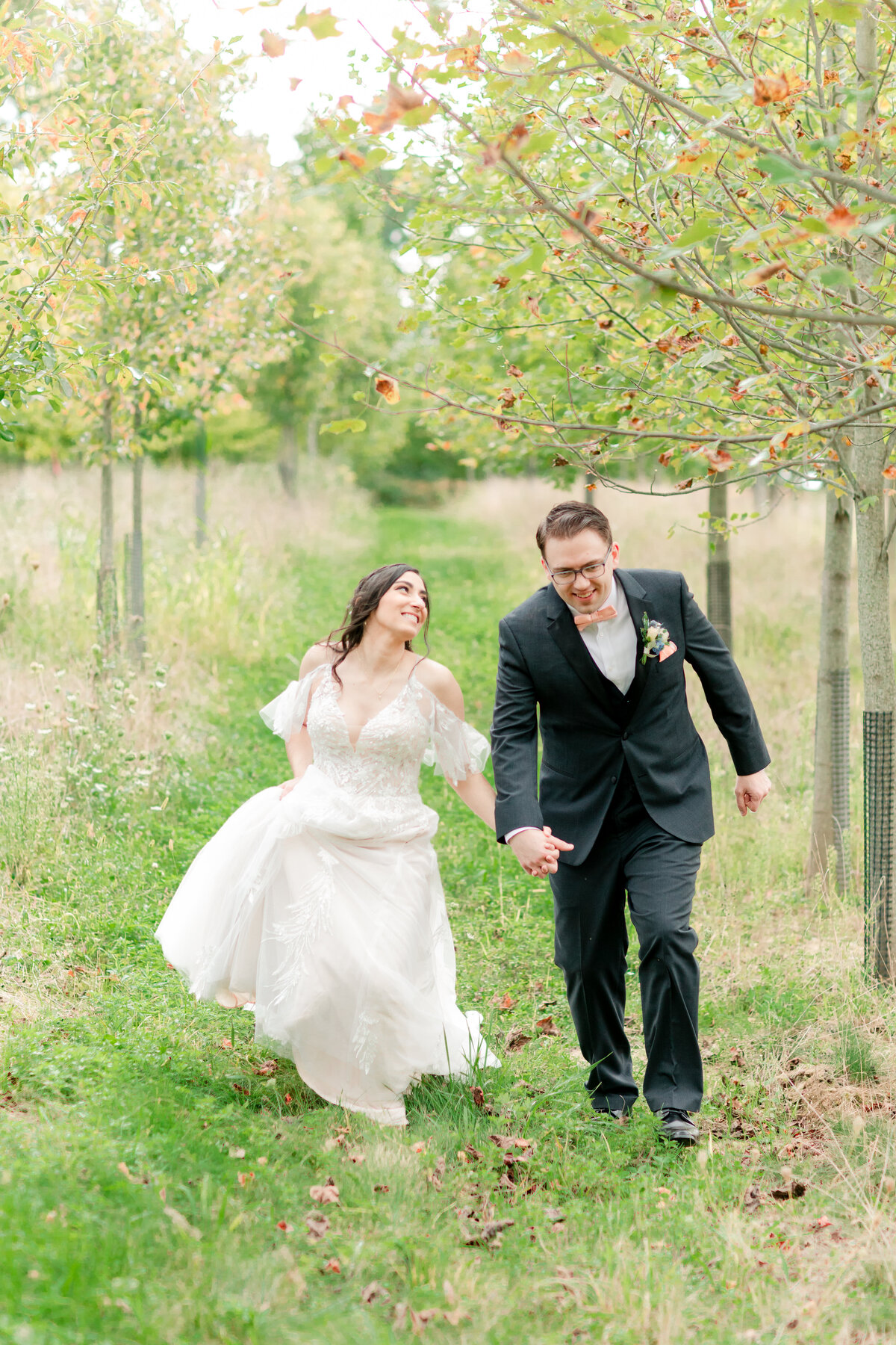 wedding photography couple running and laughing