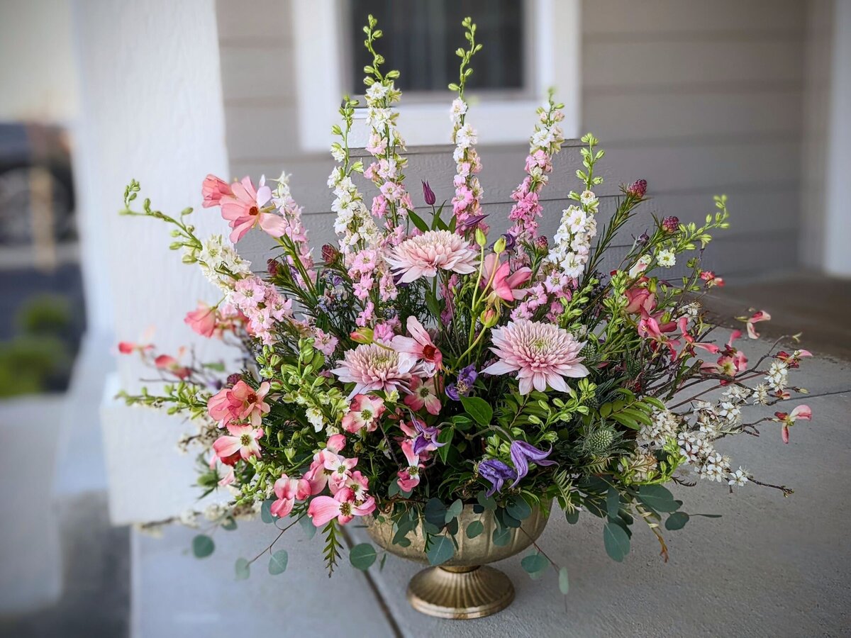 pink funeral flower arrangement 