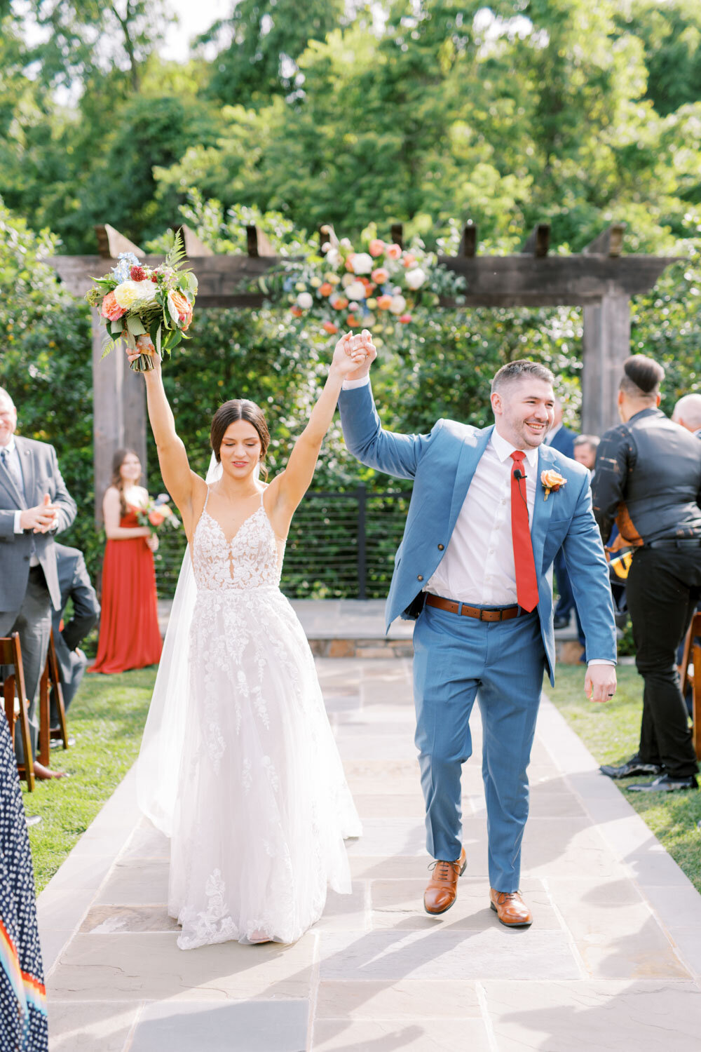 Bride and groom walking down the aisle 