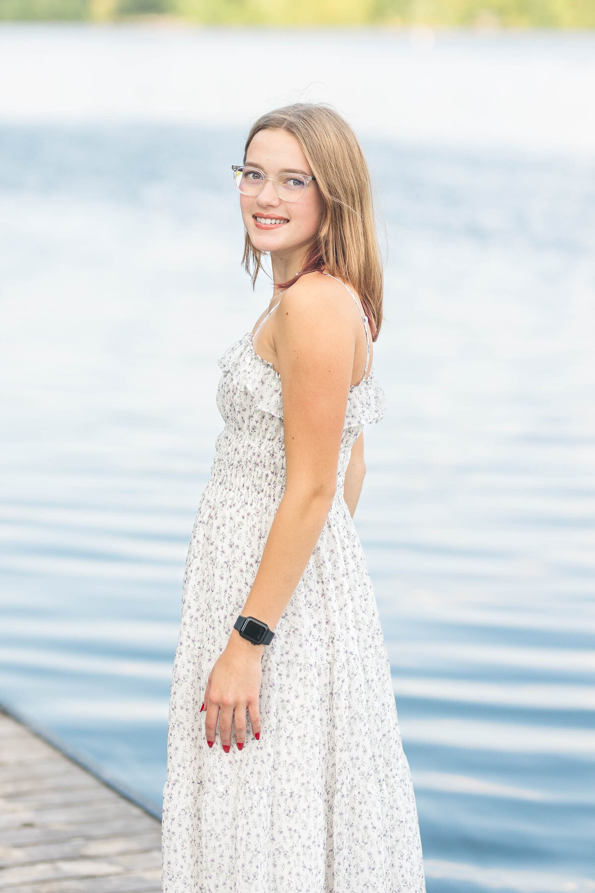 Outdoor senior photography session with a Columbus senior, featuring golden hour lighting and nature.