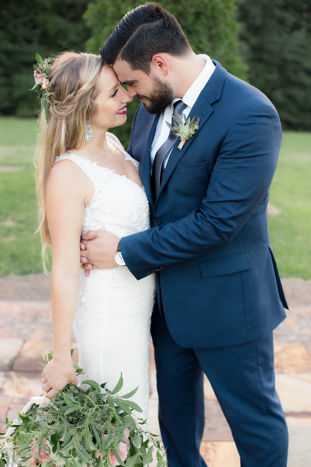Bride and groom hold each other outdoors for Atlanta wedding photographer