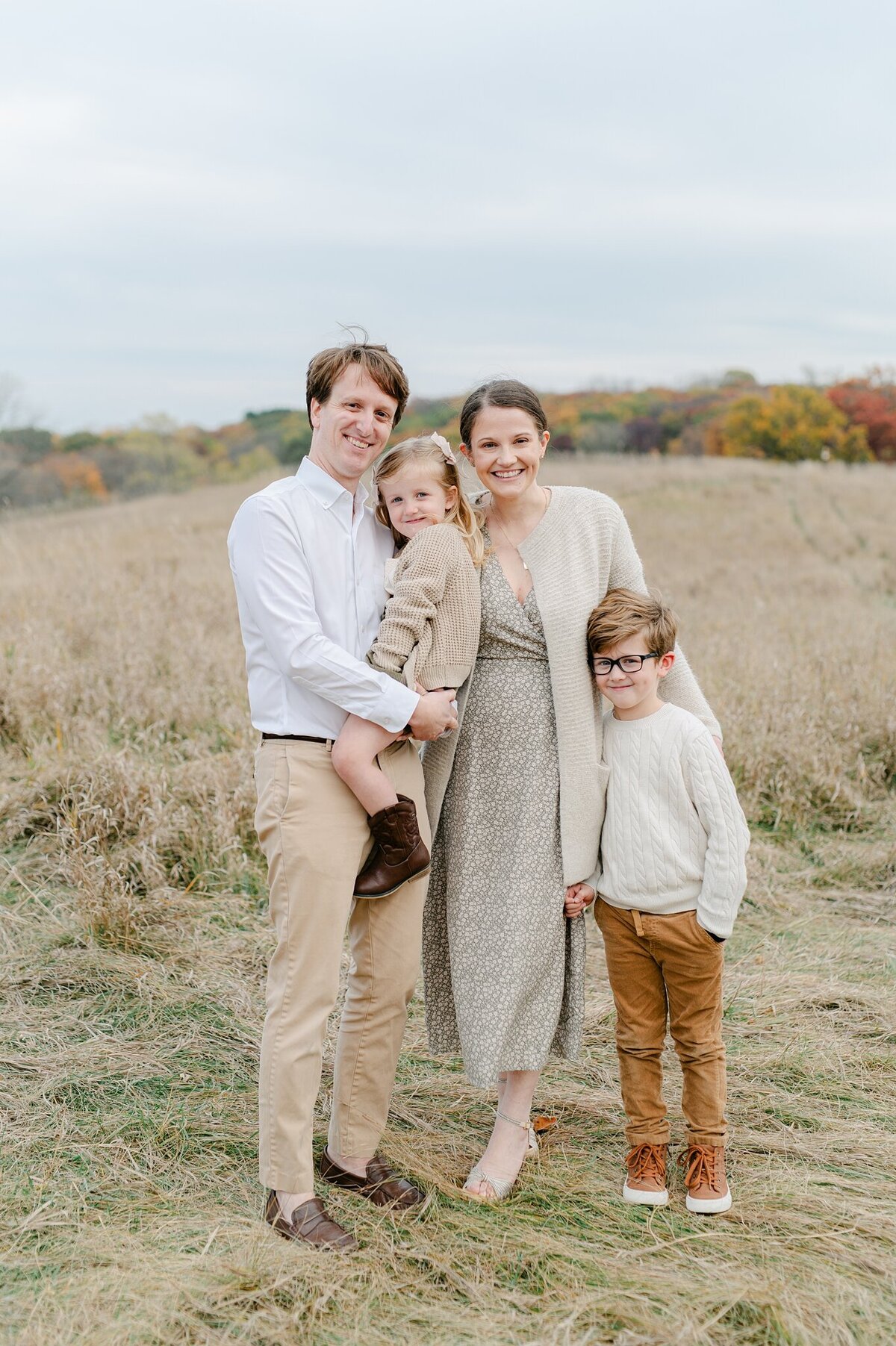 Family of 4 in Lake Country, Wisconsin smiling at the camera