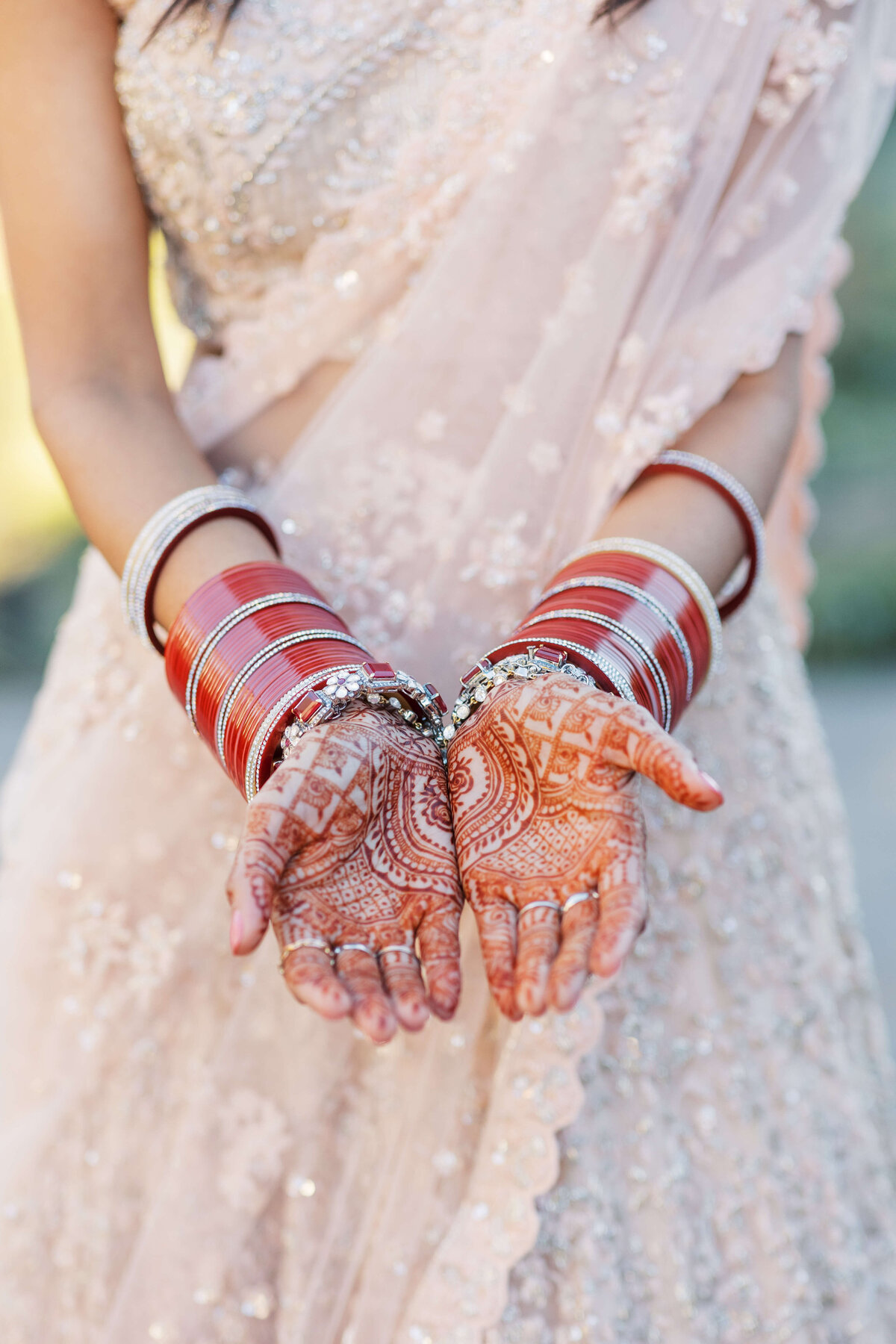 Indian bride displays her wedding day henna.