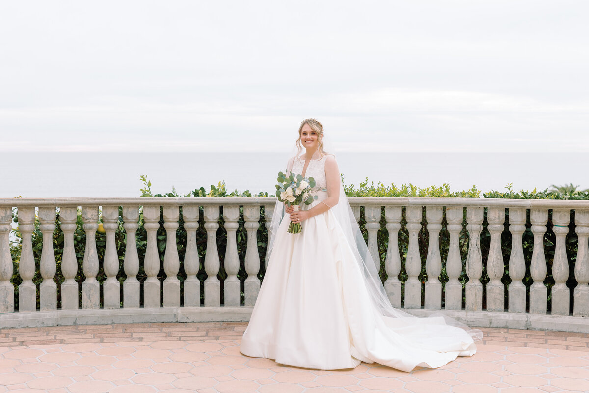 Bride overlooking the Pacific Ocean