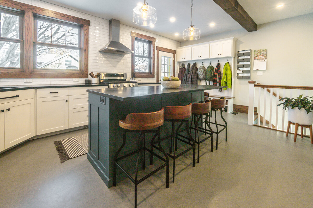 blue kitchen island with bar stools