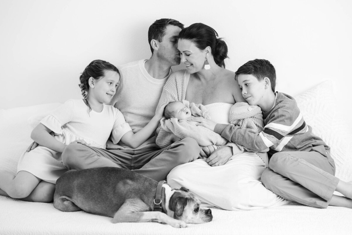 Family with a newborn and dog-33-26
