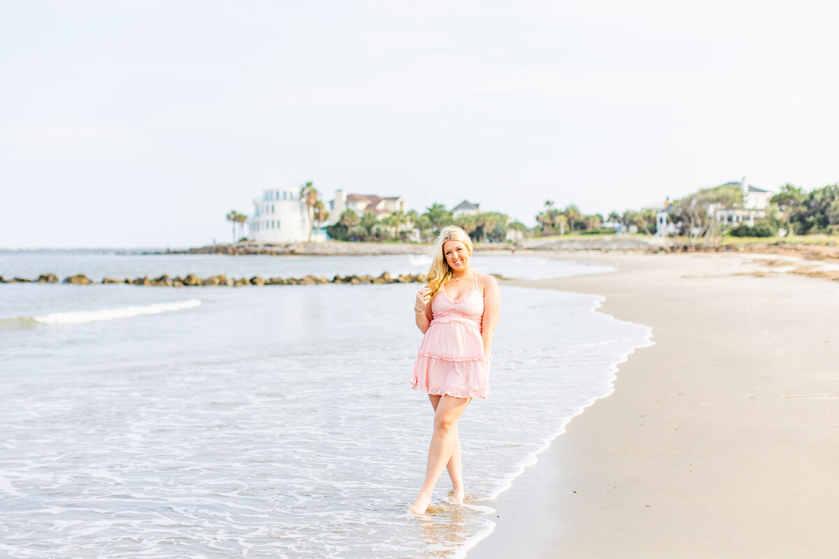 girl in pink dress at isle of palms on the beach