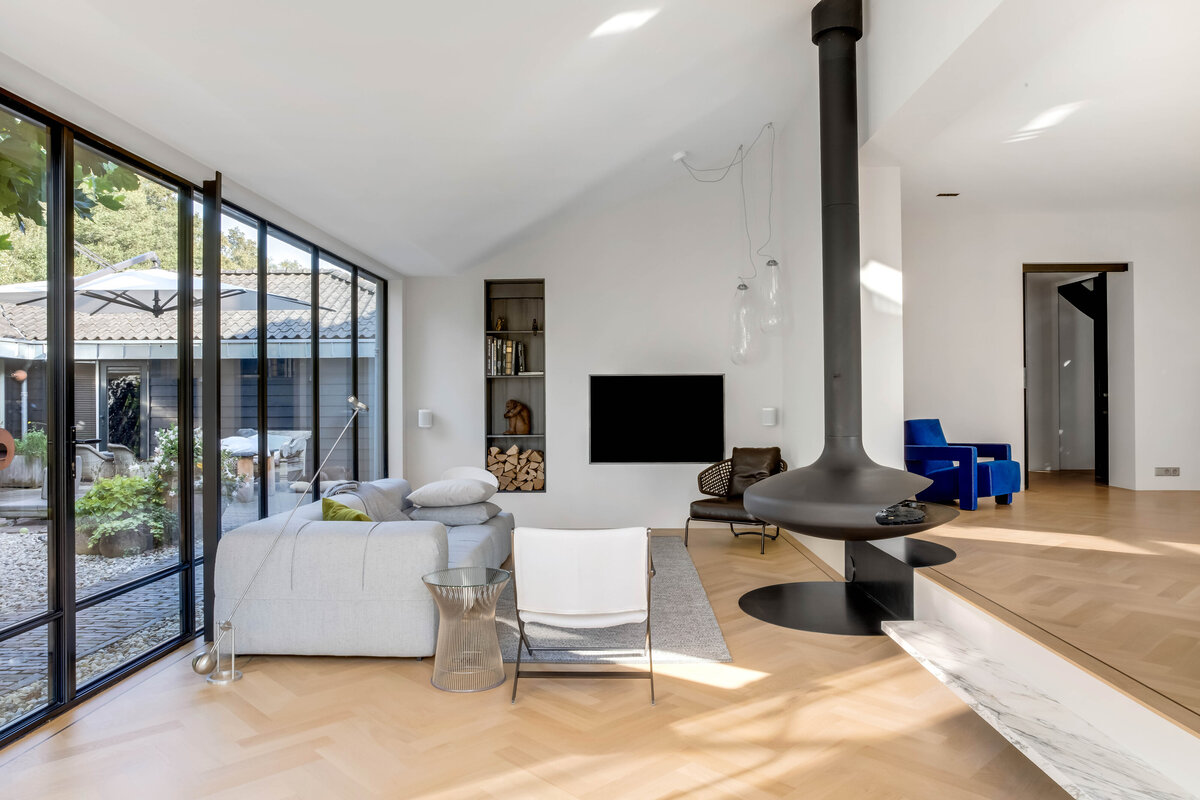 Sfeerrvolle woonkamer met harmonieuze kleuren, gefotografeerd interieur fotograaf door Kelly Noten