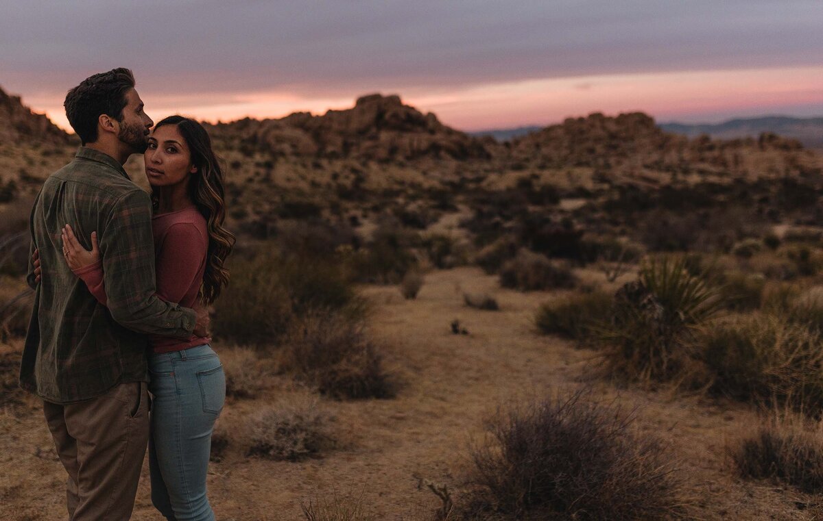 Couple hugging in Joshua tree