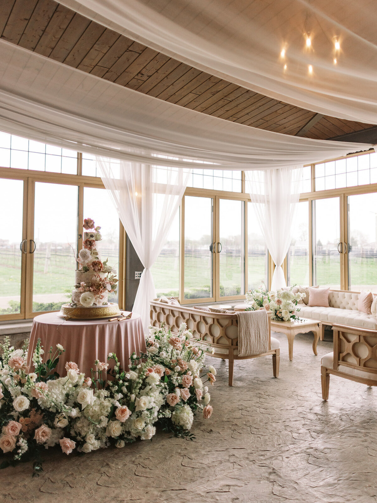 Wedding Cake and lounge at a wedding reception