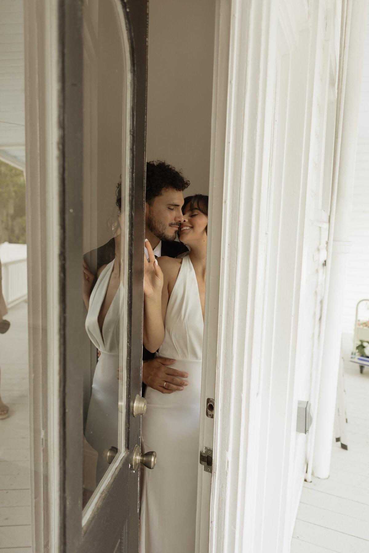 Luxury Florida wedding surrounded by tall palm trees and tropical details at The Palm Mansion in Umatilla