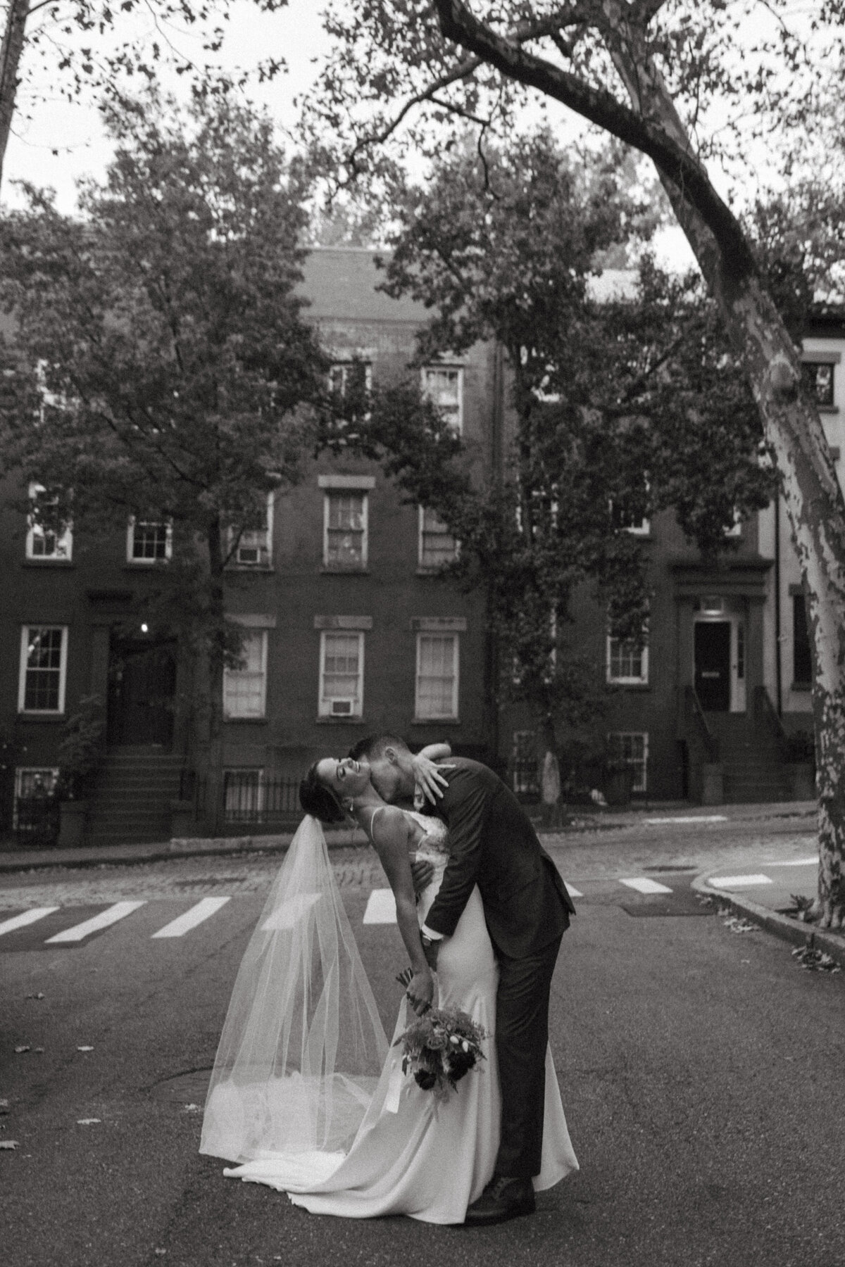 A quiet, intimate moment between bride and groom in New York City. This photo captures love and connection, with a timeless style that will remain treasured for generations.