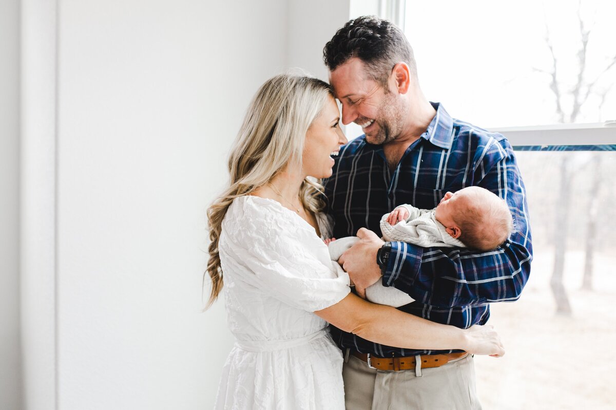 Newborn husband and wife natural light at home photography Aledo Brock Fort Worth