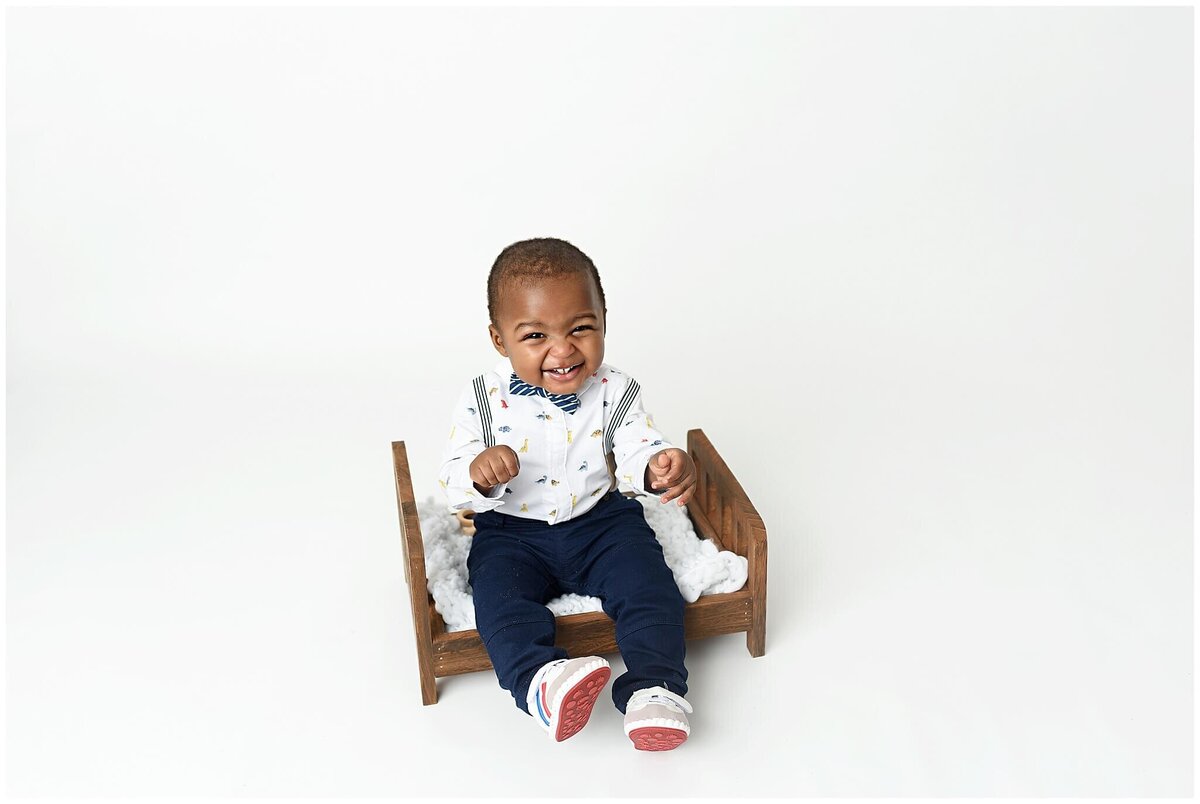 A captivating studio photo session featuring a toddler, highlighting their adorable features and personality.