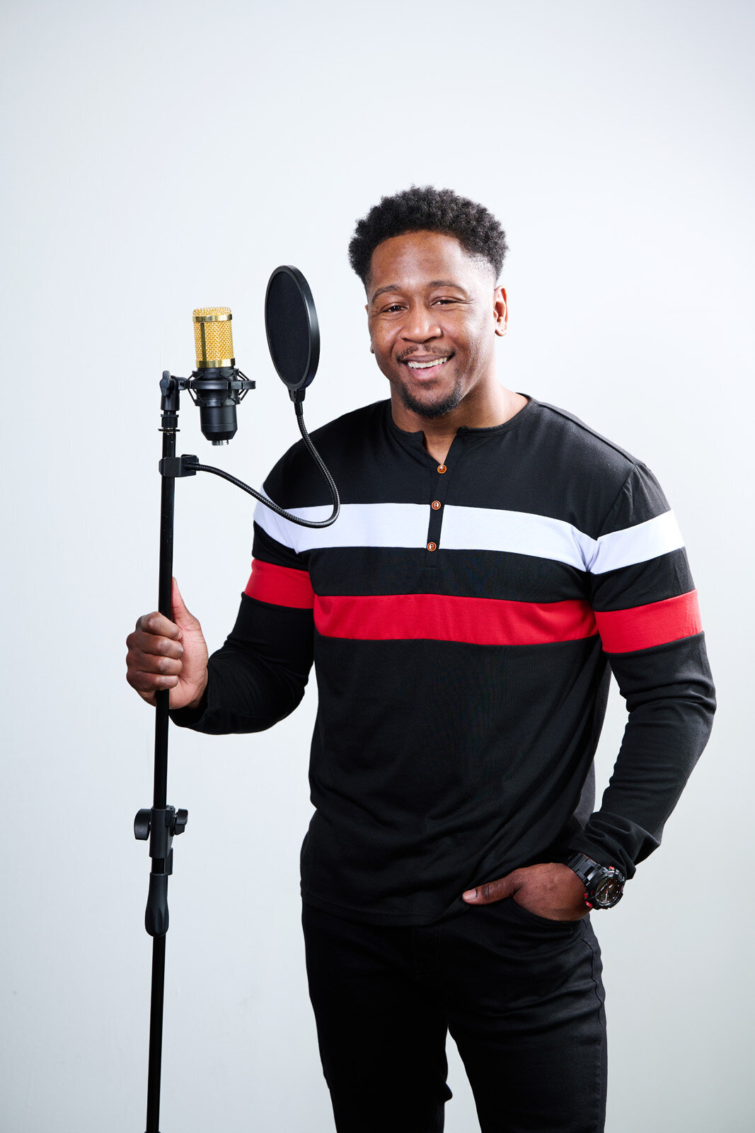 Headshot Photographer Captures Singer in Minneapolis Studio with Microphone-34