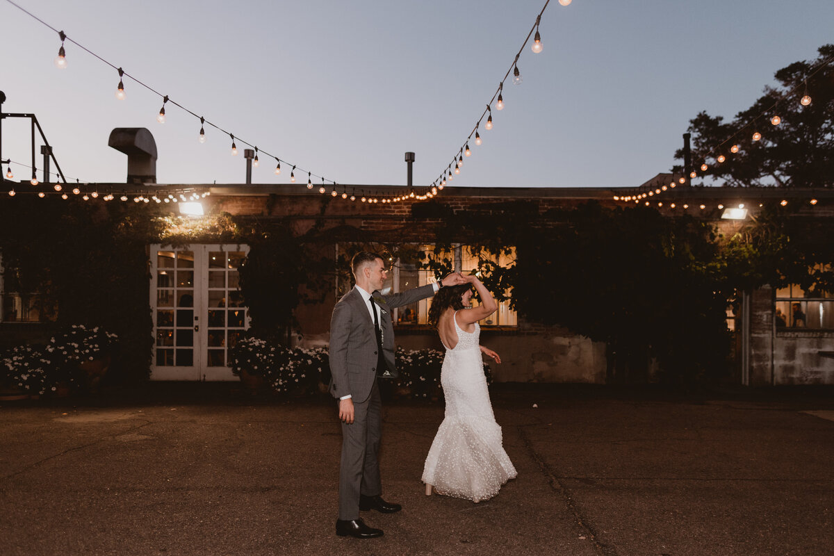 Bride and groom share a private dance outside at Blanc in Denver.