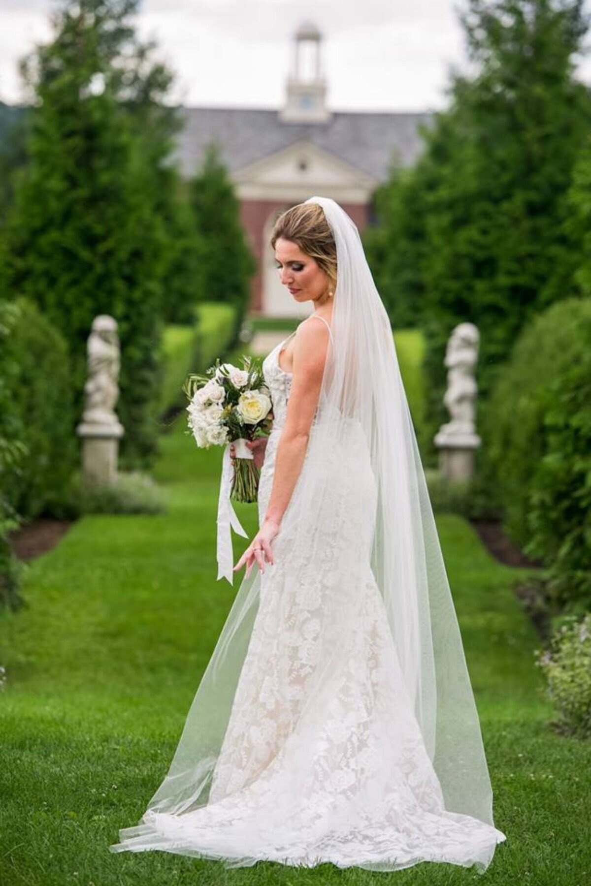 Soft and romantic bridal portrait with an elegant veil at a luxury Italian inspired Chicago North Shore wedding.