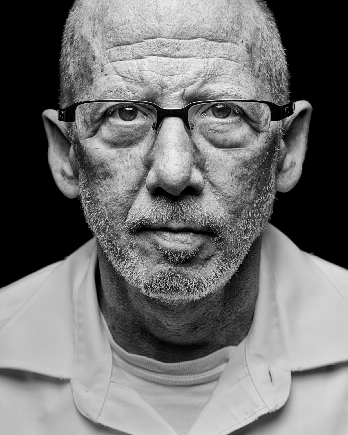 Black and white photo of a man with a beard