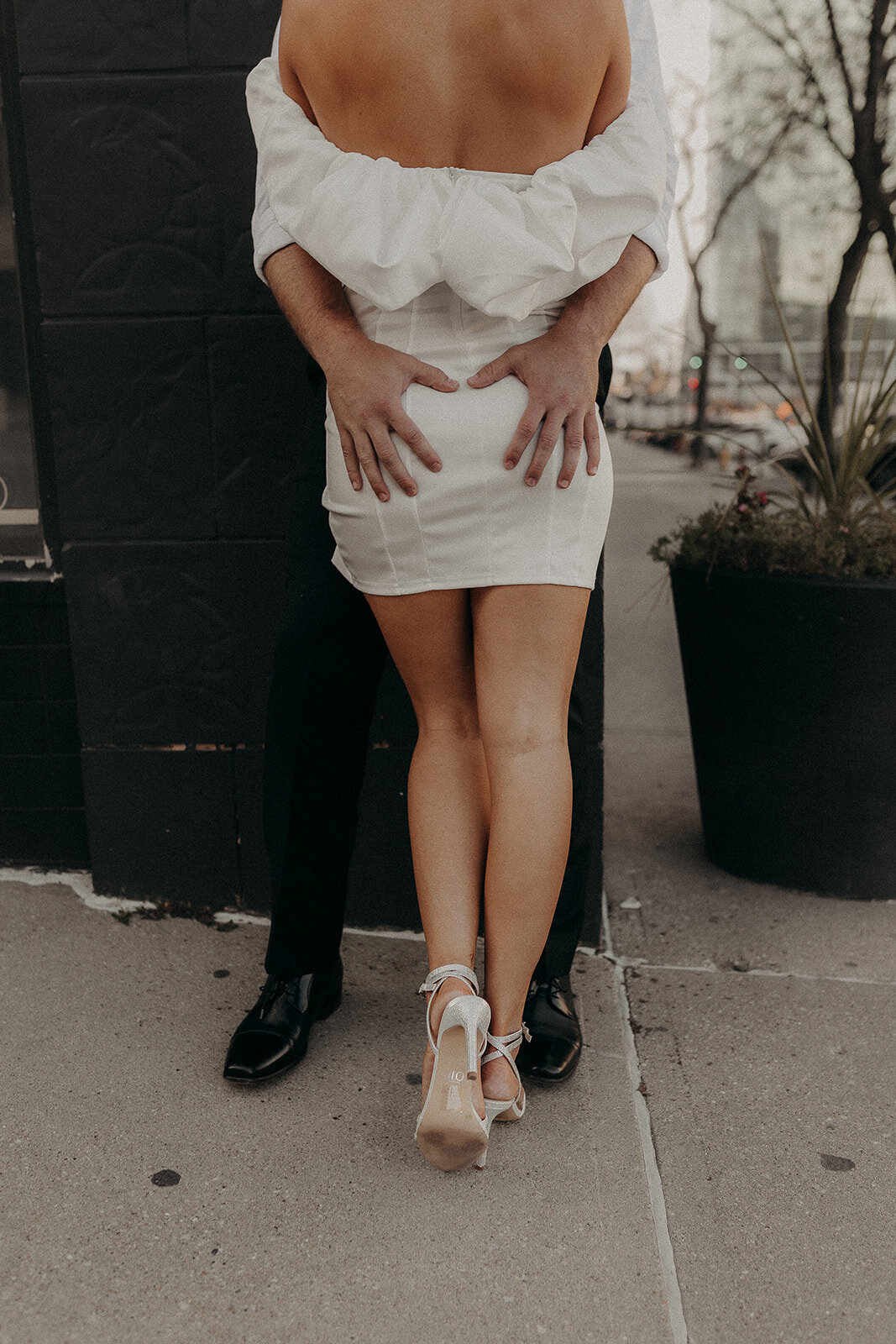 Dancing in the streets of downtown omaha for this editorial style engagement session