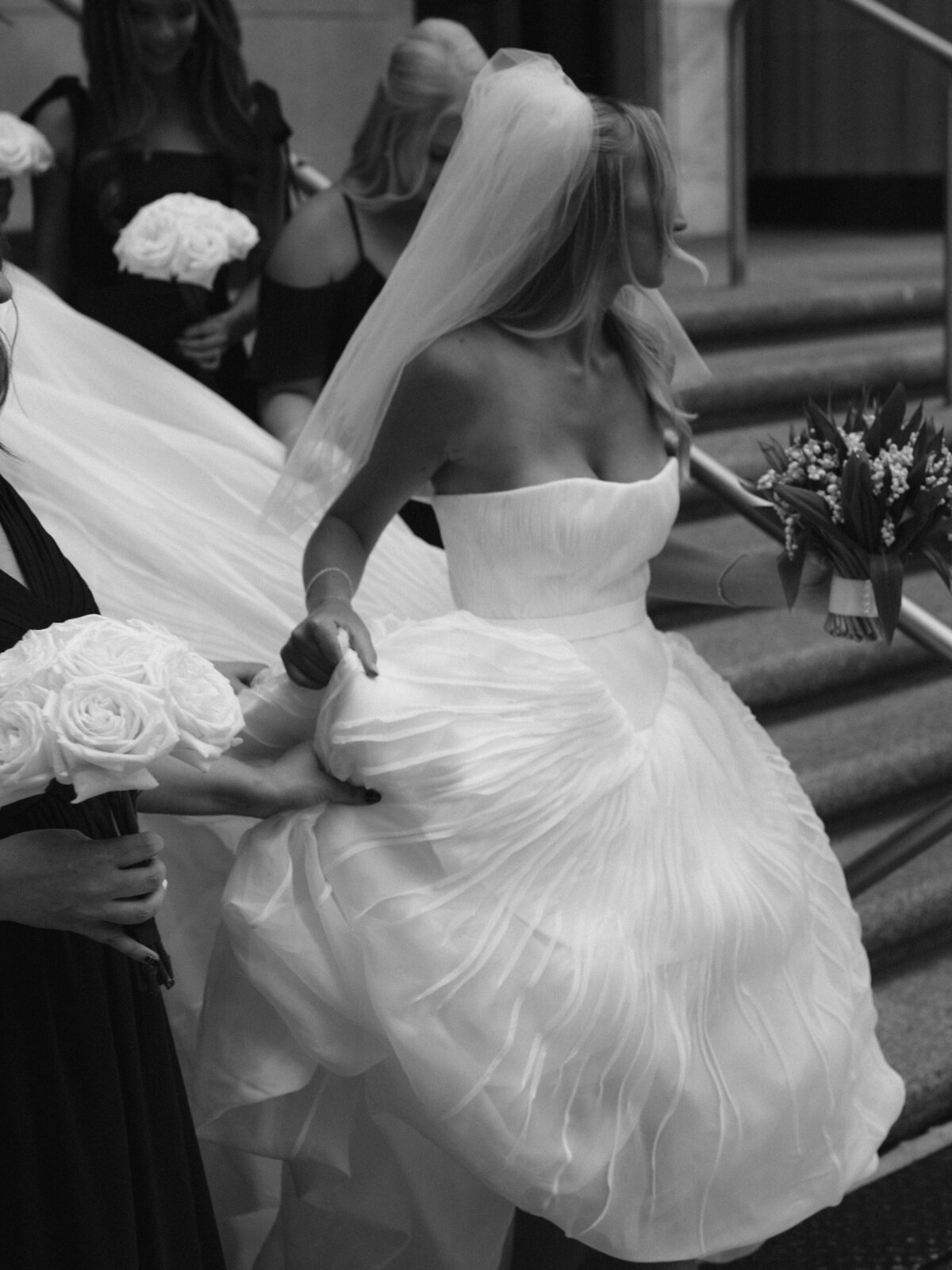 Sophisticated editorial wedding photography at Old Post Office Chicago featuring Lauren Alatriste's fashion forward approach to ceremony coverage, creating magazine-worthy imagery that combines architectural grandeur with authentic wedding emotion.