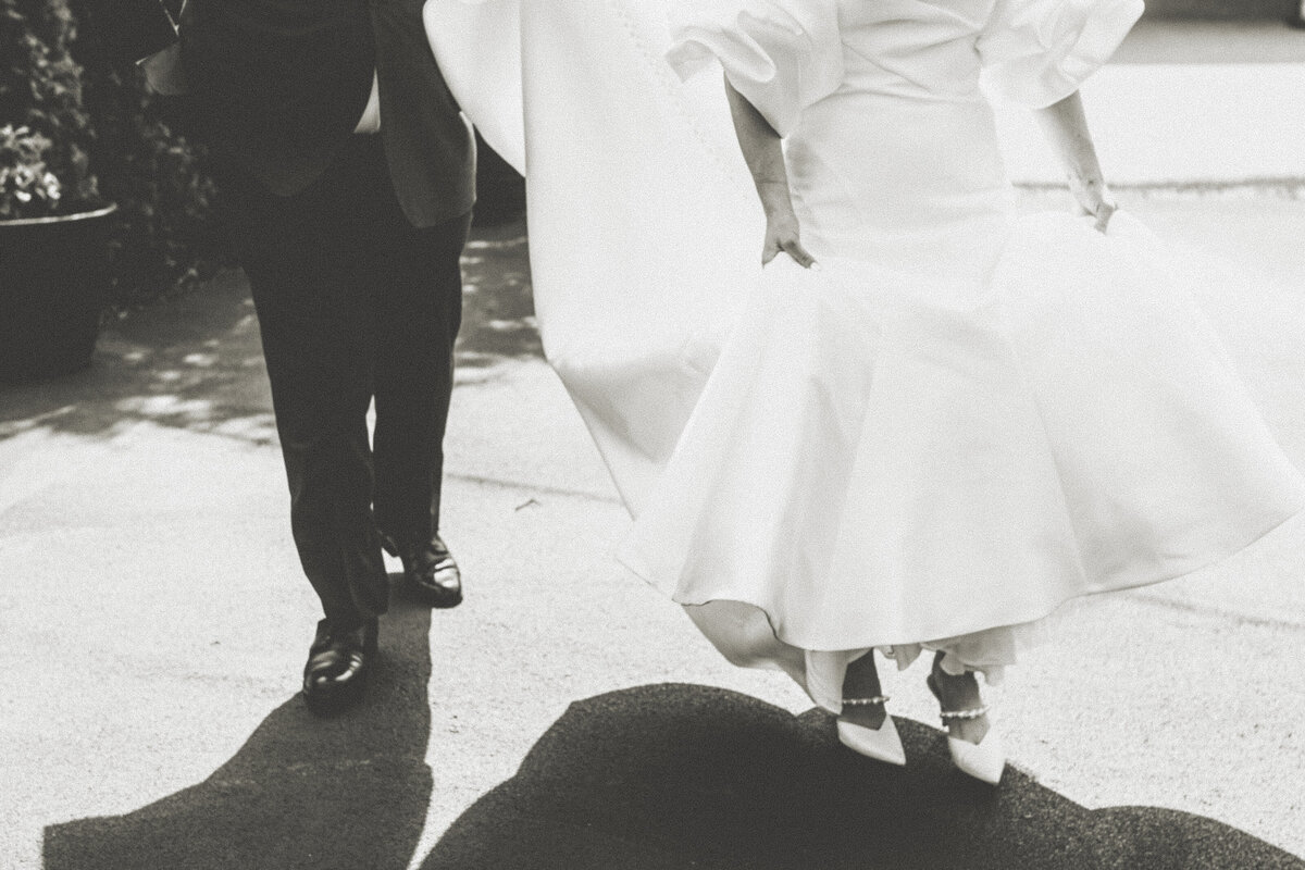 Bride and groom candid, Cafe Cortina, Farmington Hills, MI - https://methodandmatte.com/