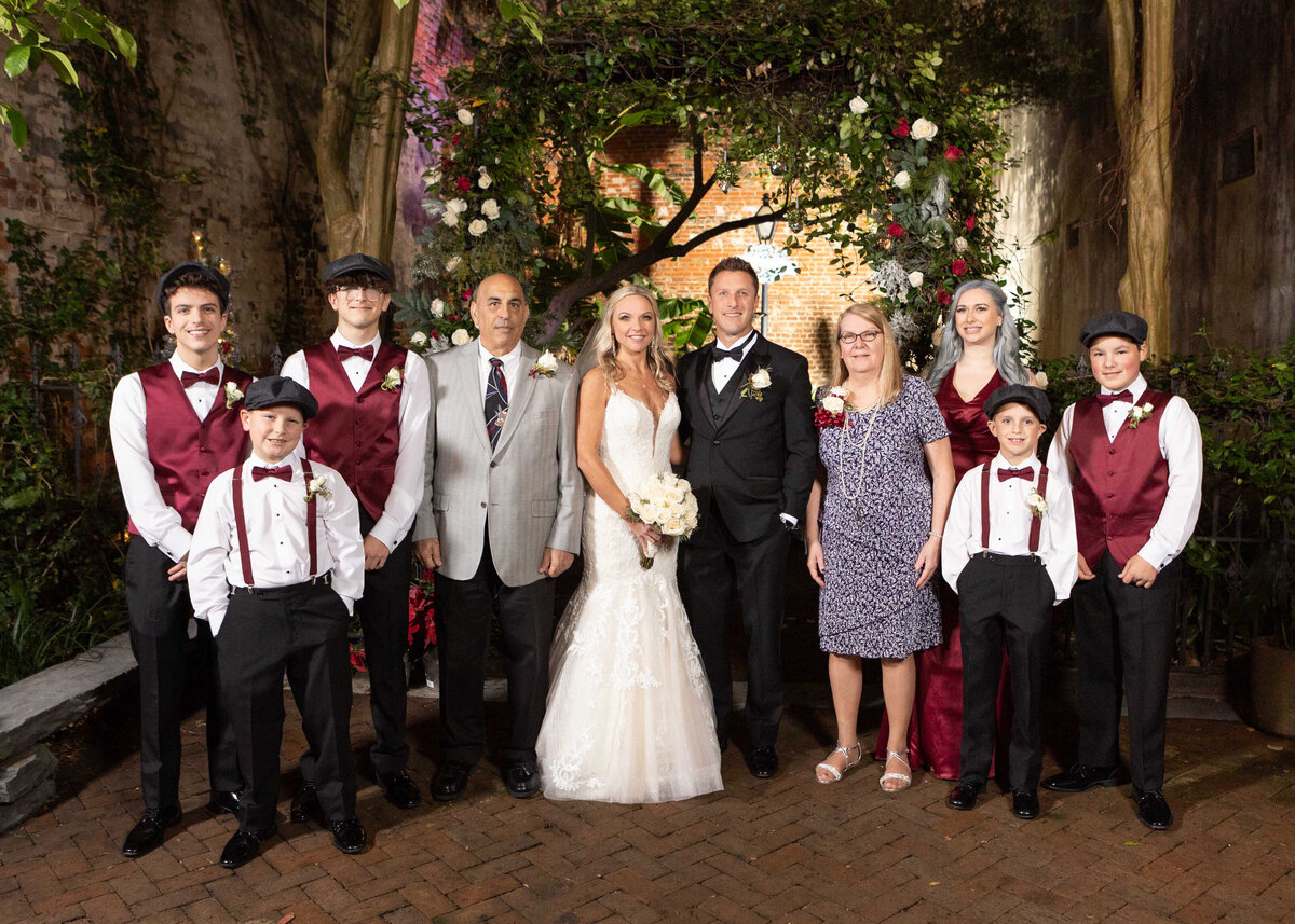 Family portraits after the Turner wedding at the Pharmacy Museum in New Orleans, Louisiana.