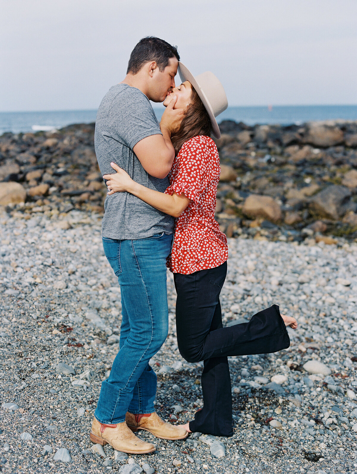 couple kissing at engagement photo session by new england engagement photographer
