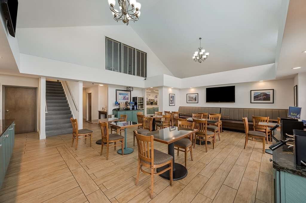 Hotel breakfast area with dining chairs