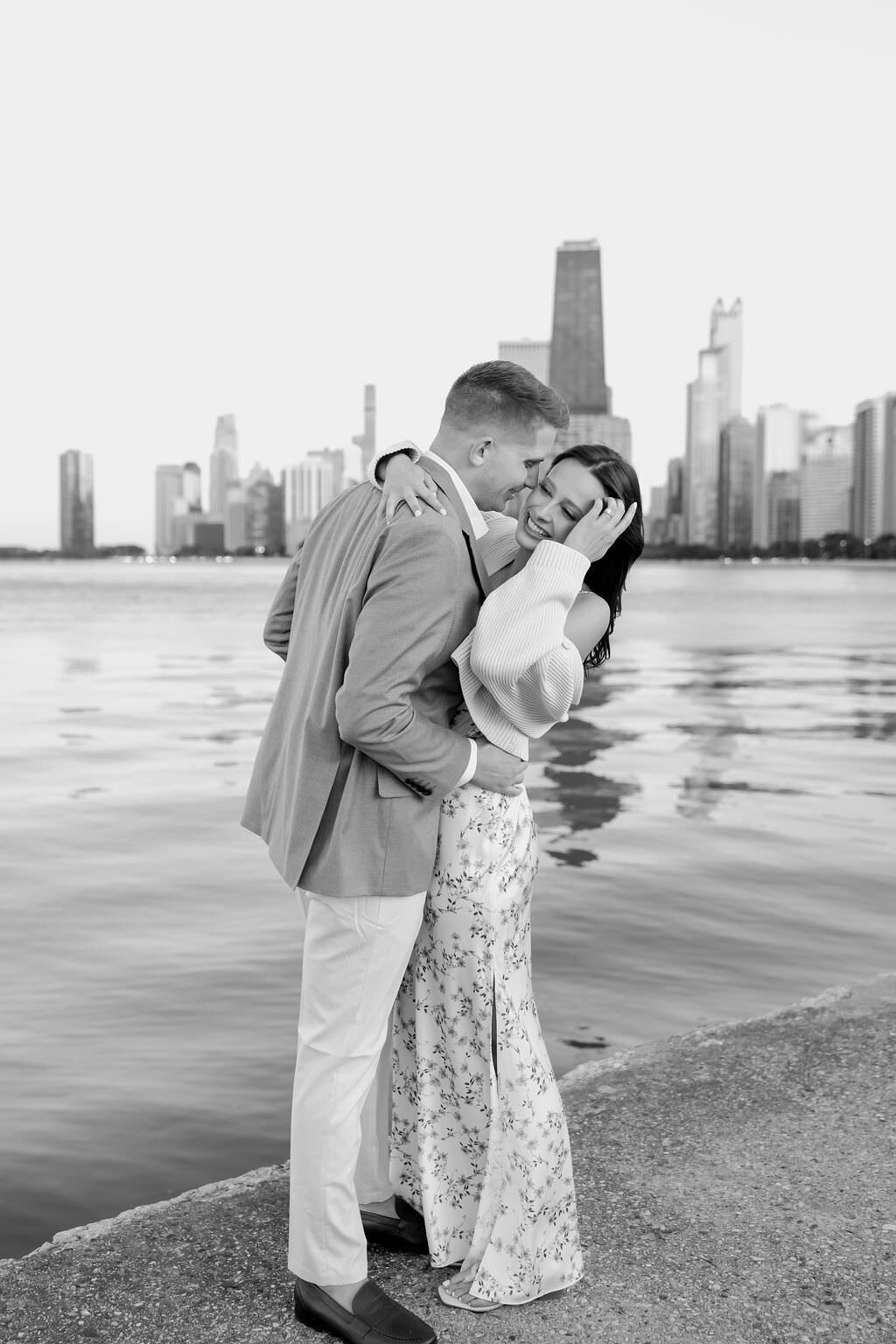 An engagement photography session at The Wrigley Building and North Ave Beach in Chicago, Illinois - 23