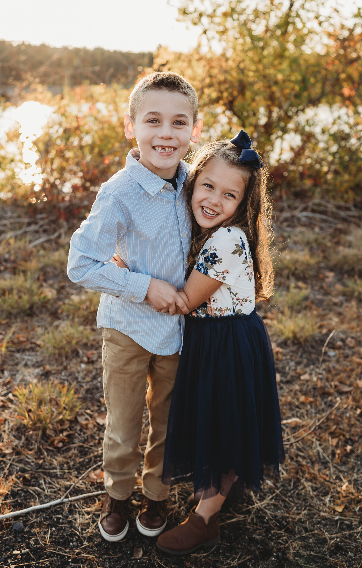 Siblings being photographed by boston family photographer kerry callahan photography