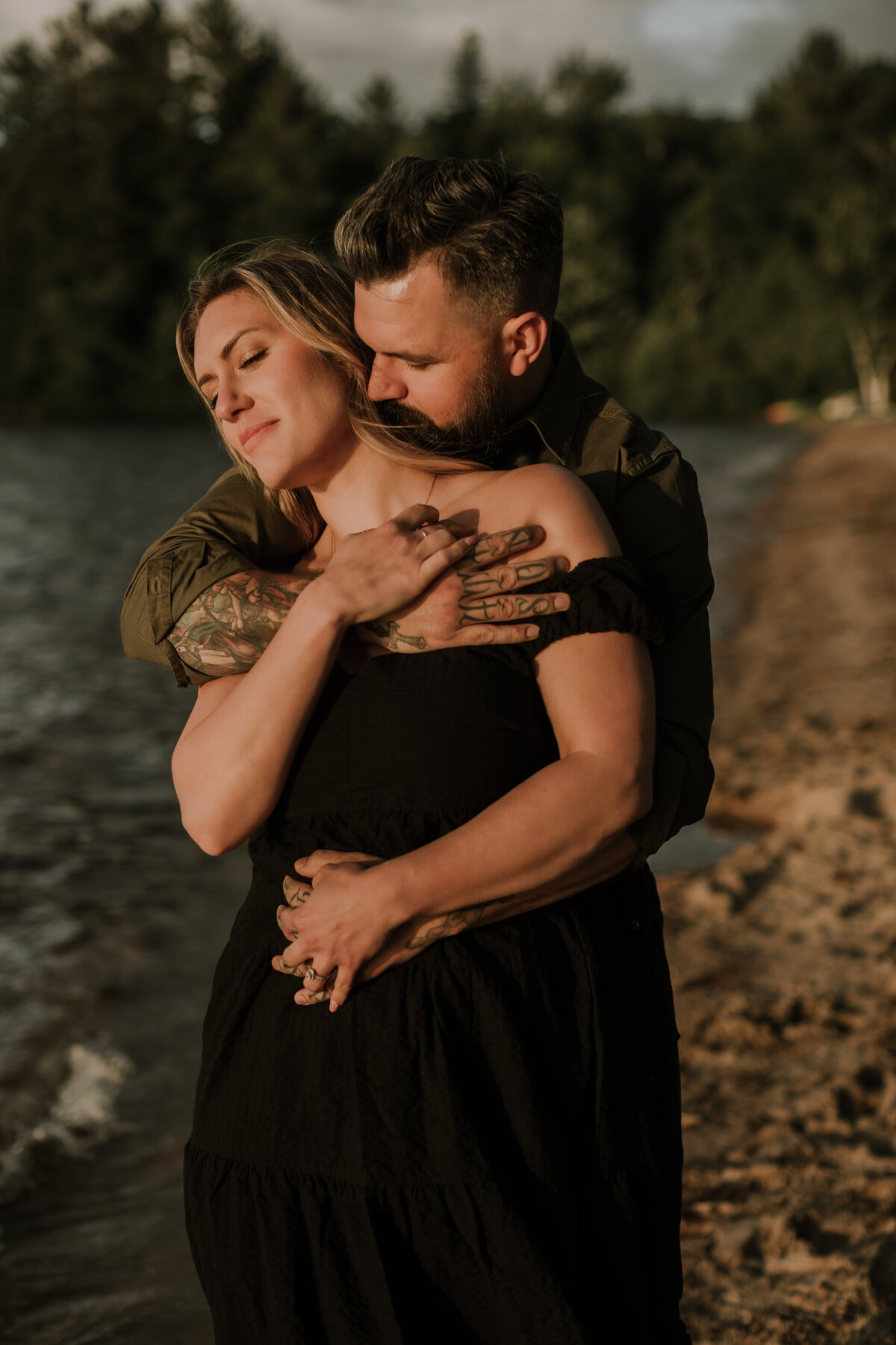 alana-andrew-engagement-cottage-beach-lake-sunset-dock-algonquin-19