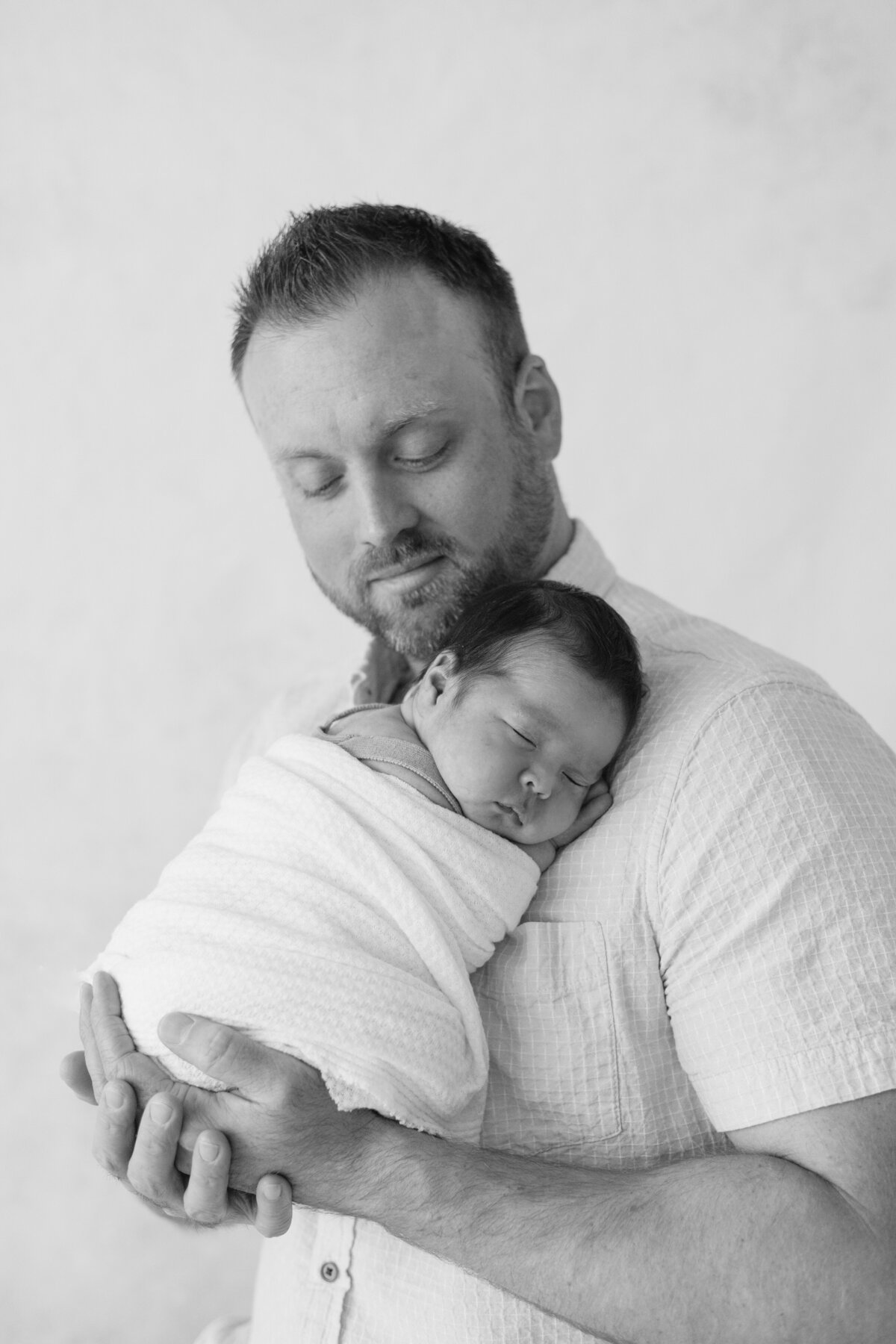 Studio newborn session with father and son located in Lewisville,TX