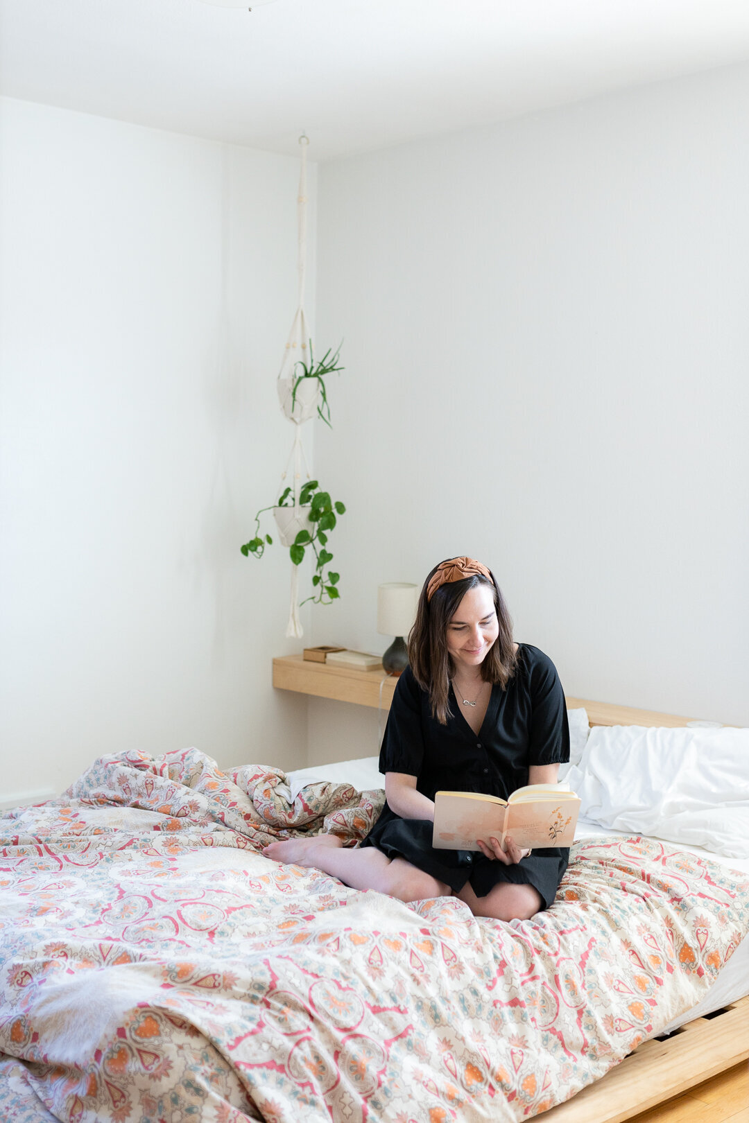 Woman does yoga in industrial wedding venue