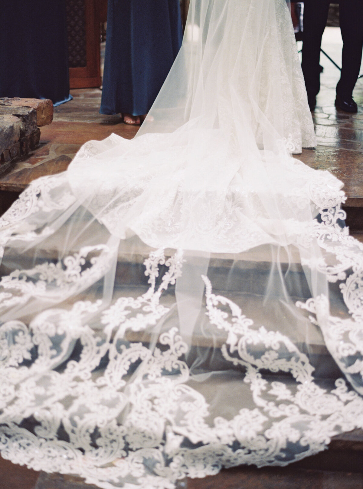 A wedding day photo of the brides wedding train at Anthony's Chapel in Hot Springs Arkansas