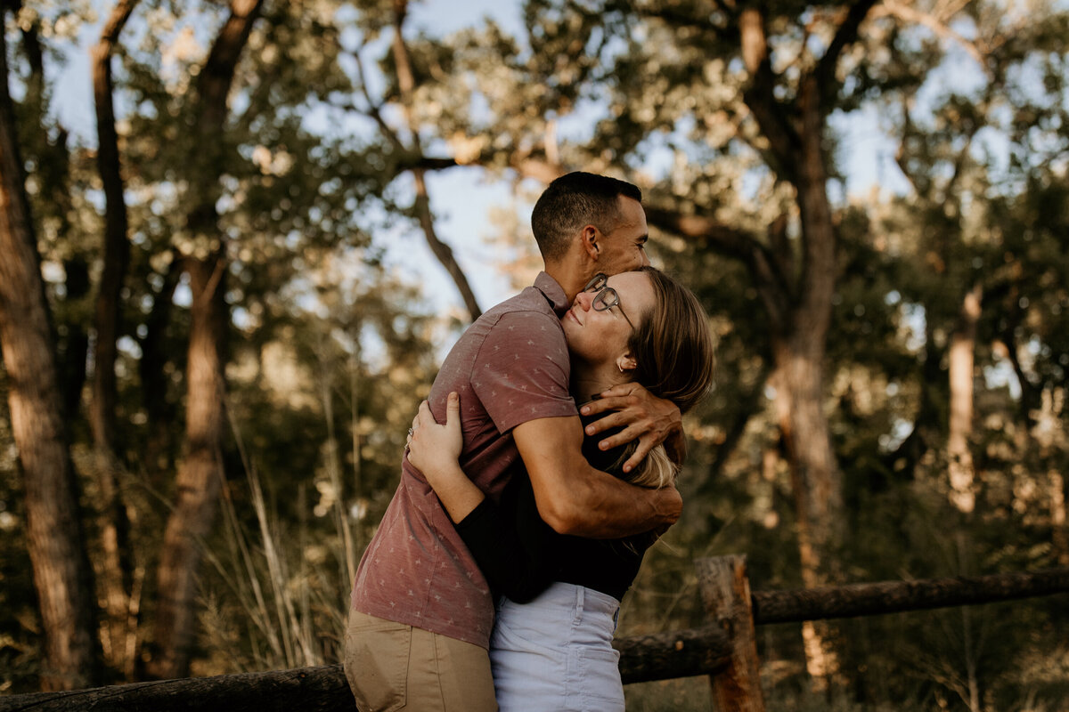 engaged couple hugging each other