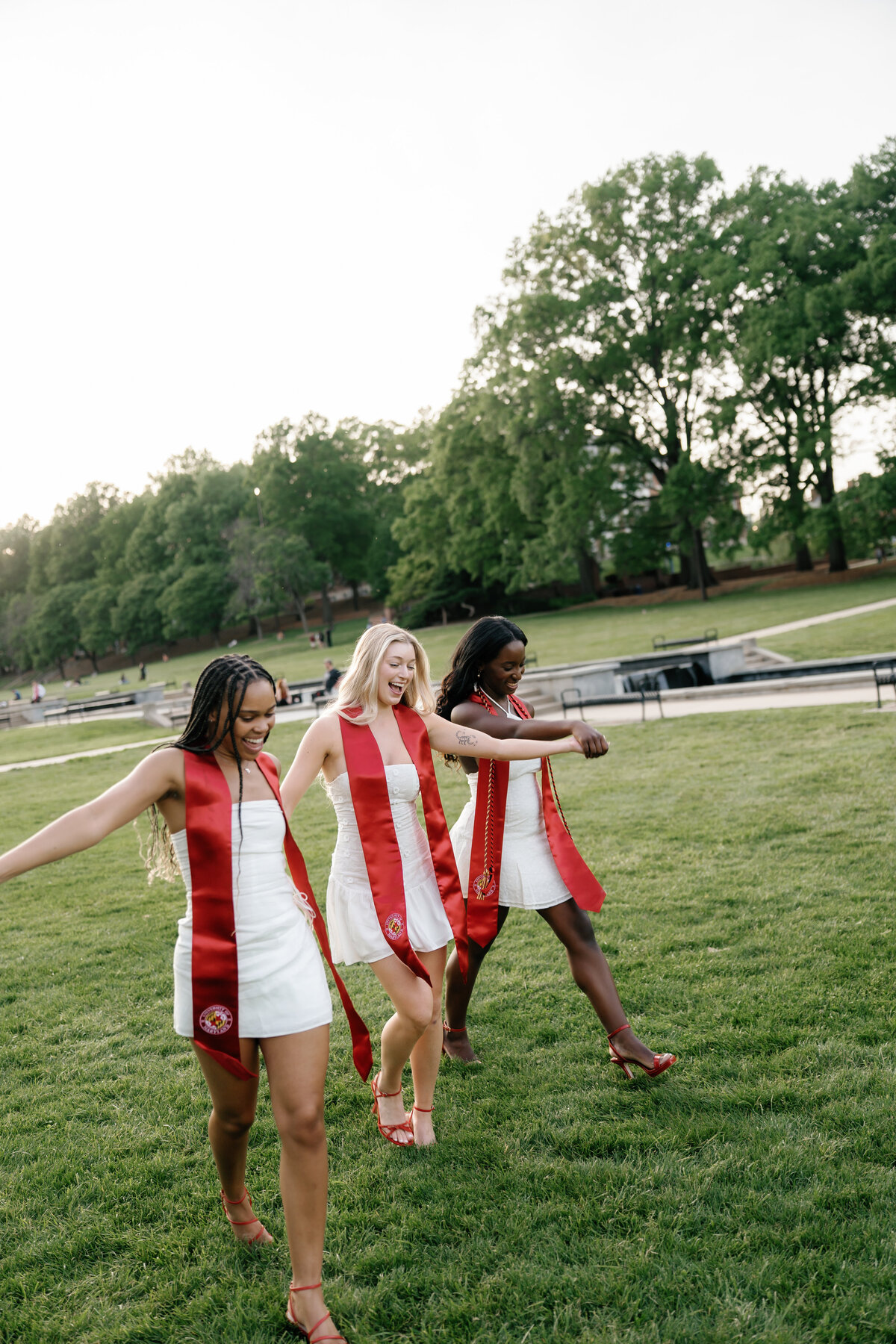 University of Maryland Graduates at McKeldin Mall in College Park Maryland Captured by UMD Graduation Photographer Brenna Marie Photography